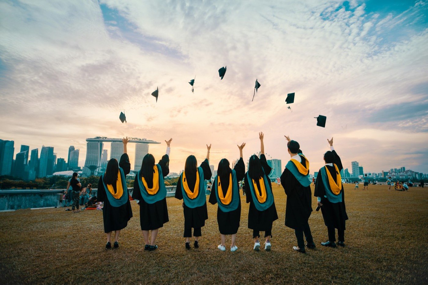 Graduates in caps and gowns representing degree attestation services
